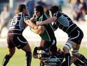 8 September 2006; John Muldoon, Connacht, is tackled by Sonny Parker, Ryan Jones and Gavin Henson, Ospreys. Magners Celtic League 2006 - 2007, Connacht v Ospreys, Sportsground, Galway. Picture credit; Ray Ryan / SPORTSFILE