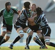 8 September 2006; Paul Warwick, Connacht, is tackled by Richard Pugh and Andrew Lloyd, Ospreys. Magners Celtic League 2006 - 2007, Connacht v Ospreys, Sportsground, Galway. Picture credit; Ray Ryan / SPORTSFILE