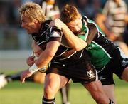 8 September 2006; Chris Keane, Connacht, is tackled by Justin Marshall, Ospreys. Magners Celtic League 2006 - 2007, Connacht v Ospreys, Sportsground, Galway. Picture credit; Ray Ryan / SPORTSFILE