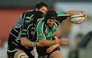 8 September 2006; Gavin Williams, Connacht, is tackled by Ryan Jones, Ospreys. Magners Celtic League 2006 - 2007, Connacht v Ospreys, Sportsground, Galway. Picture credit; Ray Ryan / SPORTSFILE