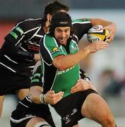 8 September 2006; Gavin Williams, Connacht, is tackled by Ryan Jones, Ospreys. Magners Celtic League 2006 - 2007, Connacht v Ospreys, Sportsground, Galway. Picture credit; Ray Ryan / SPORTSFILE