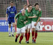 9 September 2006; Michael Halliday, centre, celebrates Glentoran's second goal with team-mates Darren Lockhart, left, and Willo McDonagh. CIS Insurance Cup (Group A), Glentoran v Youghgall, The Oval, Belfast, Co. Antrim. Picture credit: Russell Pritchard / SPORTSFILE