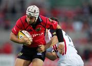 9 September 2006; Jeremy Manning, Munster, is tackled by Nick De Luca, Border Reivers. Magners Celtic League 2006 - 2007, Munster v Border Reivers, Thomond Park, Limerick. Picture credit: Kieran Clancy / SPORTSFILE