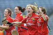 10 September 2006;  Cork players, left to right, Elaine Burke, Una O'Donoghue, Mary O'Connor and Briege Corkery, celebrate at the end of the game. Gala All-Ireland Senior Camogie Championship, Final, Cork v Tipperary, Croke Park, Dublin. Picture credit: David Maher / SPORTSFILE