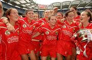 10 September 2006; Cork captain, Joanne O'Callaghan, far right, celebrates with her team-mates at the end of the game. Gala All-Ireland Senior Camogie Championship, Final, Cork v Tipperary, Croke Park, Dublin. Picture credit: David Maher / SPORTSFILE