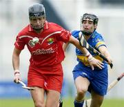 10 September 2006; Angela Walsh, Cork, in action against Sinead Nealon, Tipperary. Gala All-Ireland Senior Camogie Championship, Final, Cork v Tipperary, Croke Park, Dublin. Picture credit: David Maher / SPORTSFILE