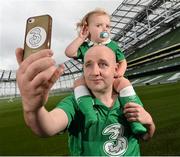 28 July 2014; Pictured are Kevin Whelan, with his daughter Maia, age 2 years, members of You Boys In Green, Ireland's widest network of Irish football supporters, at the Aviva Stadium to launch Three’s new Power Your Network campaign. Three is celebrating the rollout of 4G by inviting networks of people across Ireland, like YBIG, to share their story for a chance to win a cash prize. To enter, simply log on to Three’s Facebook page at Facebook.com/3Ireland and share the story of #YourNetwork. Aviva Stadium, Lansdowne Road, Dublin. Picture credit: David Maher / SPORTSFILE