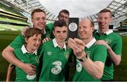 28 July 2014; Pictured are, from left, Ruairi Kinsella, age 12, Kevin Crane, Ryan Crane, age 16, Paul McAuliffe, Alan Keane and Paul Kinsella, members of You Boys In Green, Ireland's widest network of Irish football supporters, at the Aviva Stadium to launch Three’s new Power Your Network campaign. Three is celebrating the rollout of 4G by inviting networks of people across Ireland, like YBIG, to share their story for a chance to win a cash prize. To enter, simply log on to Three’s Facebook page at Facebook.com/3Ireland and share the story of #YourNetwork. Aviva Stadium, Lansdowne Road, Dublin. Picture credit: David Maher / SPORTSFILE