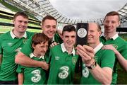 28 July 2014; Pictured are, from left, Paul McAuliffe, Ruairi Kinsella, age 12, Kevin Crane, Ryan Crane, age 16, Alan Keane and Paul Kinsella, members of You Boys In Green, Ireland's widest network of Irish football supporters, at the Aviva Stadium to launch Three’s new Power Your Network campaign. Three is celebrating the rollout of 4G by inviting networks of people across Ireland, like YBIG, to share their story for a chance to win a cash prize. To enter, simply log on to Three’s Facebook page at Facebook.com/3Ireland and share the story of #YourNetwork. Aviva Stadium, Lansdowne Road, Dublin. Picture credit: David Maher / SPORTSFILE