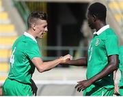 29 July 2014; Ireland's Luke Evans, left, and Tomiwa Badun celebrate after the match. 2014 CPISRA Football 7-A-Side European Championships, Ireland v Portugal, Maia, Portugal. Picture credit: Carlos Patrão / SPORTSFILE