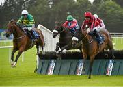 29 July 2014; Shield, left, with Robbie Power up, jumps the last ahead of Here For The Craic, centre, with Davy Condon up, who finished fifth, and Queen Alphabet, right, with Davy Russell up, who finished second, on their way to winning the Topaz Novice Hurdle. Galway Racing Festival, Ballybrit, Co. Galway. Picture credit: Barry Cregg / SPORTSFILE