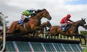 29 July 2014; Shield, left, with Robbie Power up, jumps the last ahead of Queen Alphabet, with Davy Russell up, who finished second, on their way to winning the Topaz Novice Hurdle. Galway Racing Festival, Ballybrit, Co. Galway. Picture credit: Barry Cregg / SPORTSFILE