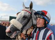 29 July 2014; Jockey Gary Halpin with Vastonea after winning the Topaz Mile Handicap. Galway Racing Festival, Ballybrit, Co. Galway. Picture credit: Barry Cregg / SPORTSFILE