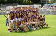 27 July 2014; The Wexford squad pose for the traditional team photograph before the game. GAA Hurling All Ireland Senior Championship Quarter-Final, Limerick v Wexford. Semple Stadium, Thurles, Co. Tipperary. Picture credit: Diarmuid Greene / SPORTSFILE