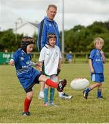 30 July 2014; Thomas Cully, aged 6, from Sallins, Co. Kildare, in action during the The Herald Leinster Rugby Summer Camps in Cill Dara RFC, Co. Kildare. Picture credit: Piaras Ó Mídheach / SPORTSFILE