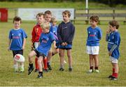 30 July 2014; Fionn Moore, aged 7, from Kildare Town, in action during the The Herald Leinster Rugby Summer Camps in Cill Dara RFC, Co. Kildare. Picture credit: Piaras Ó Mídheach / SPORTSFILE