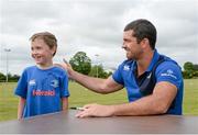 30 July 2014; Joshua Scanlon, aged, 7, from Monasterevin, Co. Kildare, with Leinster and Ireland rugby player Rob Kearney during the The Herald Leinster Rugby Summer Camps in Cill Dara RFC, Co. Kildare. Picture credit: Piaras Ó Mídheach / SPORTSFILE
