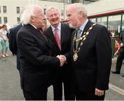 30 July 2014; The President of Ireland Michael D. Higgins is greeted on his arrival for the day's races by Mayor of Galway City Donal Lyons, right, and Terry Cunningham, centre, Chairman of Galway Race Committee. Galway Racing Festival, Ballybrit, Co. Galway. Picture credit: Barry Cregg / SPORTSFILE