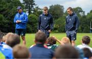 30 July 2014; Leinster Academy players Garry Ringrose, centre, and Nick McCarthy, right, in the company of coach Ben Armstrong, speak to participants during a Leinster School of Excellence Camp. The King's Hospital, Palmerstown, Dublin. Picture credit: Brendan Moran / SPORTSFILE