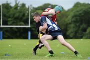 30 July 2014; Ethan Baxter, Greystones, Co. Wicklow, is tackled by Patrick Corrigan, from Newbridge, Co. Kildare, during a Leinster School of Excellence Camp. The King's Hospital, Palmerstown, Dublin. Picture credit: Brendan Moran / SPORTSFILE