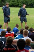 30 July 2014; Leinster Academy players Garry Ringrose, left, and Nick McCarthy, speak to participants during a Leinster School of Excellence Camp. The King's Hospital, Palmerstown, Dublin. Picture credit: Brendan Moran / SPORTSFILE