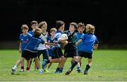 30 July 2014; Daniel Cheng, age 9, in action during the The Herald Leinster Rugby Summer Camps in Wanderers FC, Merrion Road, Co. Dublin. Picture credit: Dáire Brennan / SPORTSFILE