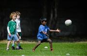 30 July 2014; Anshram Venkat, age 6, in action during the The Herald Leinster Rugby Summer Camps in Wanderers FC, Merrion Road, Co. Dublin. Picture credit: Dáire Brennan / SPORTSFILE