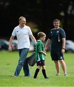 30 July 2014; Ireland head coach Joe Schmidt picks up his son Luke after the The Herald Leinster Rugby Summer Camps in Wanderers FC, Merrion Road, Co. Dublin. Picture credit: Dáire Brennan / SPORTSFILE