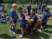 30 July 2014; Leinster's Zane Kirchner signs Homer Reynolds' jersey during the The Herald Leinster Rugby Summer Camps in Wanderers FC, Merrion Road, Co. Dublin. Picture credit: Dáire Brennan / SPORTSFILE