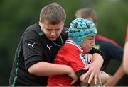 30 July 2014; Michael Fitzpatrick, left, from Artane, Dublin, tackles Ethan Baxter, from Greystones, Co. Wicklow, during a Leinster School of Excellence Camp. The King's Hospital, Palmerstown, Dublin. Picture credit: Brendan Moran / SPORTSFILE
