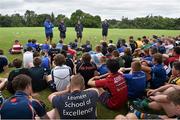 30 July 2014; Leinster Academy players Garry Ringrose, 2nd from left, and Nick McCarthy, 2nd from right, in the company of coach Ben Armstrong, left, and Tom McKeown, speak to participants during a Leinster School of Excellence Camp. The King's Hospital, Palmerstown, Dublin. Picture credit: Brendan Moran / SPORTSFILE