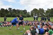 30 July 2014; Coaches Ben Armstrong and Will Matthews demonstrate tackle technique to participants during a Leinster School of Excellence Camp. The King's Hospital, Palmerstown, Dublin. Picture credit: Brendan Moran / SPORTSFILE