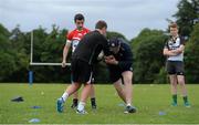 30 July 2014; Coach Stephen Coy demonstrates tackle technique to participants during a Leinster School of Excellence Camp. The King's Hospital, Palmerstown, Dublin. Picture credit: Brendan Moran / SPORTSFILE