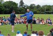 30 July 2014; Coaches Stephen Maher, left, and Ben Armstrong demonstrate a tackle technique to participants during a Leinster School of Excellence Camp. The King's Hospital, Palmerstown, Dublin. Picture credit: Brendan Moran / SPORTSFILE