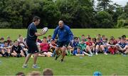 30 July 2014; Coaches Stephen Maher, left, and Ben Armstrong demonstrate a tackle technique to participants during a Leinster School of Excellence Camp. The King's Hospital, Palmerstown, Dublin. Picture credit: Brendan Moran / SPORTSFILE