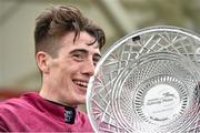 30 July 2014; Jockey Shane Shortall holds up the Galway Plate after he rode Road to Riches to win thetote.com Galway Plate. Galway Racing Festival, Ballybrit, Co. Galway. Picture credit: Barry Cregg / SPORTSFILE