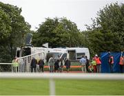 30 July 2014; Republic of Ireland manager Martin O'Neill, centre in grey suit, and his friend Justin Carthy, in beige overcoat, Head of Racecource Management for Ladbrokes and owner of Break My Mind, look on as jockey Sarah Lynam is attended to after Mr Carthy's horse had fallen in the Grab A Grand With Tote Maiden. Galway Racing Festival, Ballybrit, Co. Galway. Picture credit: Ray McManus / SPORTSFILE