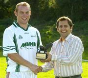 9 September 2006; Mayo's Fintan Ruddy is presented with his trophy by Bertrand Boisse, MBNA, after winning the 2006 MBNA Kick Fada Final. Bray Emmets GAA Club, Bray, Co. Wicklow. Picture credit: Pat Murphy / SPORTSFILE