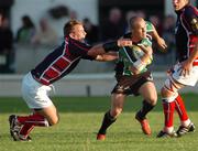 15 September 2006; Paul Warwick, Connacht, is tackled by Mathew Watkins, Llanelli Scarlets. Magners Celtic League 2006 - 2007, Connacht v Llanelli. Picture Ray Ryan / SPORTSFILE