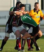 15 September 2006; John Muldoon and Matt Lacey, Connacht, are tackled by Stephen Jones, Llanelli Scarlets. Magners Celtic League 2006 - 2007, Connacht v Llanelli. Picture credit; Ray Ryan / SPORTSFILE