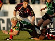 15 September 2006; Mark McHugh, Connacht, is tackled by Mathew Watkins and Dafydd James, Llanelli Scarlets. Magners Celtic League 2006 - 2007, Connacht v Llanelli. Picture credit; Ray Ryan / SPORTSFILE