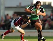 15 September 2006; Gavin Williams, Connacht, is tackled by Mathew Watkins, Llanelli Scarlets. Magners Celtic League 2006 - 2007, Connacht v Llanelli. Picture Credit; Ray Ryan / SPORTSFILE