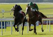 16 September 2006; Kastoria, with Mick Kinane up, races clear of Yeats, with Kieran Fallon up, left, on their way to winning the Irish Field St. Leger. Curragh Racecourse, Co. Kildare. Picture credit: Pat Murphy / SPORTSFILE