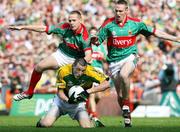 17 September 2006; Kieran Donaghy, Kerry, in action against Mayo's David Brady and David Heaney, right. Bank of Ireland All-Ireland Senior Football Championship Final, Kerry v Mayo, Croke Park, Dublin.  Picture credit: Oliver McVeigh / SPORTSFILE