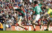 17 September 2006; Pat Harte, Mayo, scores his side's second goal as team-mate Kevin O'Neill and Diarmuid Murphy, Kerry, look on. Bank of Ireland All-Ireland Senior Football Championship Final, Kerry v Mayo, Croke Park, Dublin. Picture credit: Brendan Moran / SPORTSFILE