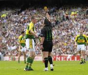 17 September 2006; Kieran Donaghy, Kerry, is shown the yellow card by referee Brian Crowe. Bank of Ireland All-Ireland Senior Football Championship Final, Kerry v Mayo, Croke Park, Dublin.  Picture credit: Ray McManus / SPORTSFILE