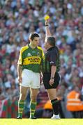 17 September 2006; Tom O'Sullivan, Kerry, is shown the Yellow Card by referee Brian Crowe. Bank of Ireland All-Ireland Senior Football Championship Final, Kerry v Mayo, Croke Park, Dublin. Picture credit: Ray McManus / SPORTSFILE