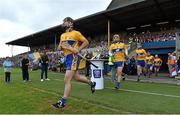 30 July 2014; Clare players, including Gearoid O'Connell, Jarlath Colleran and Bobby Duggan make their way out for the start of the game. Bord Gais Energy Munster GAA Hurling Under 21 Championship Final, Cork v Clare, Cusack Park, Ennis, Co. Clare. Picture credit: Diarmuid Greene / SPORTSFILE