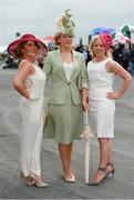 31 July 2014; Katie Duffy, left, Ciara Duffy, both from Kilmovee, Co. Mayo, and Rachel Davoren, right, from Moycullen, Co. Galway, enjoying a day at the races. Galway Racing Festival, Ballybrit, Co. Galway. Picture credit: Barry Cregg / SPORTSFILE