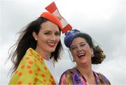 31 July 2014; Ciara Silke, left, from Bushypark, Co. Galway, and Sarah McGahon, from Bray, Co. Wicklow, enjoying a day at the races. Galway Racing Festival, Ballybrit, Co. Galway. Picture credit: Barry Cregg / SPORTSFILE